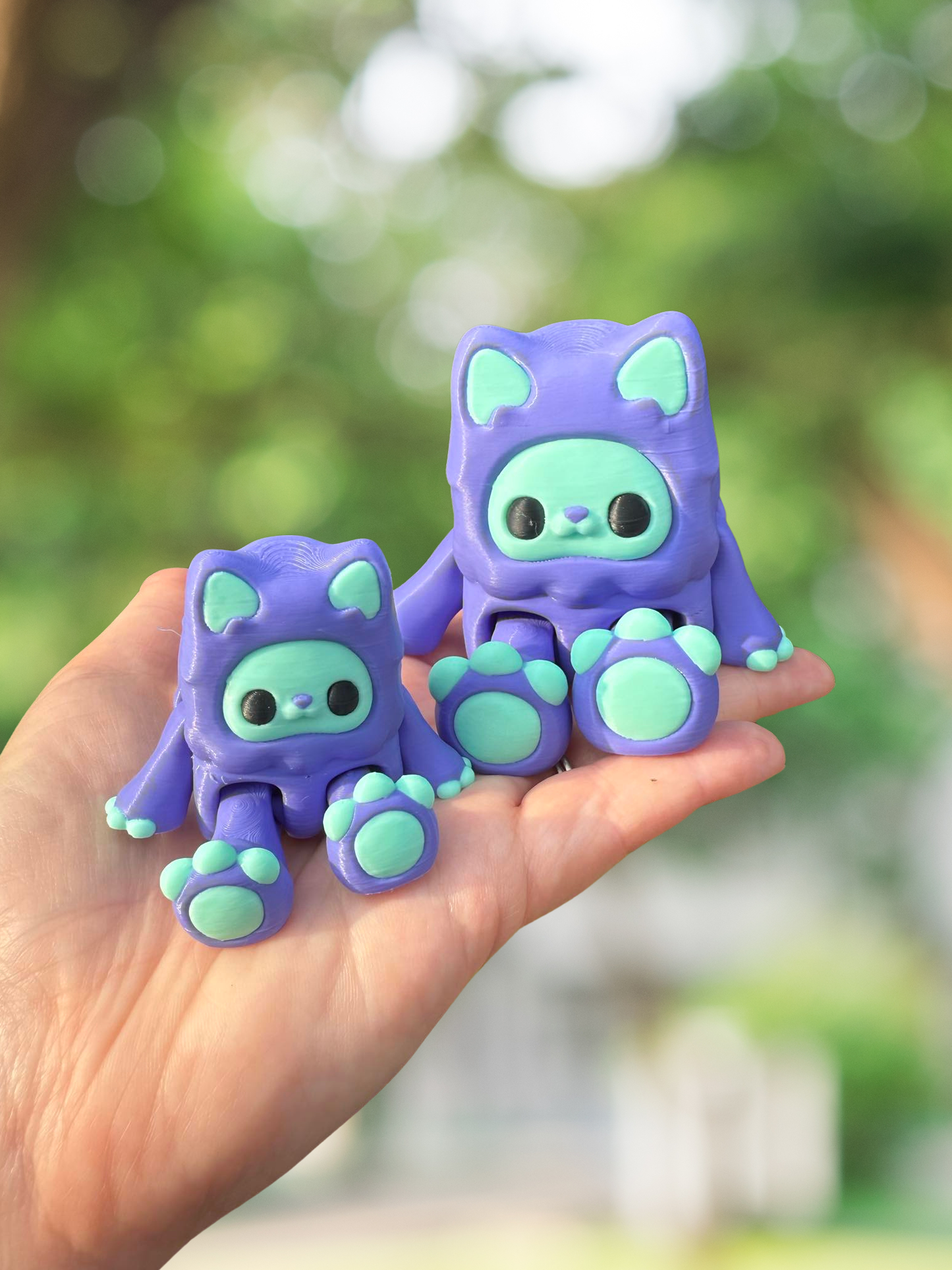 3D printed periwinkle kitty yeti articulated figurine