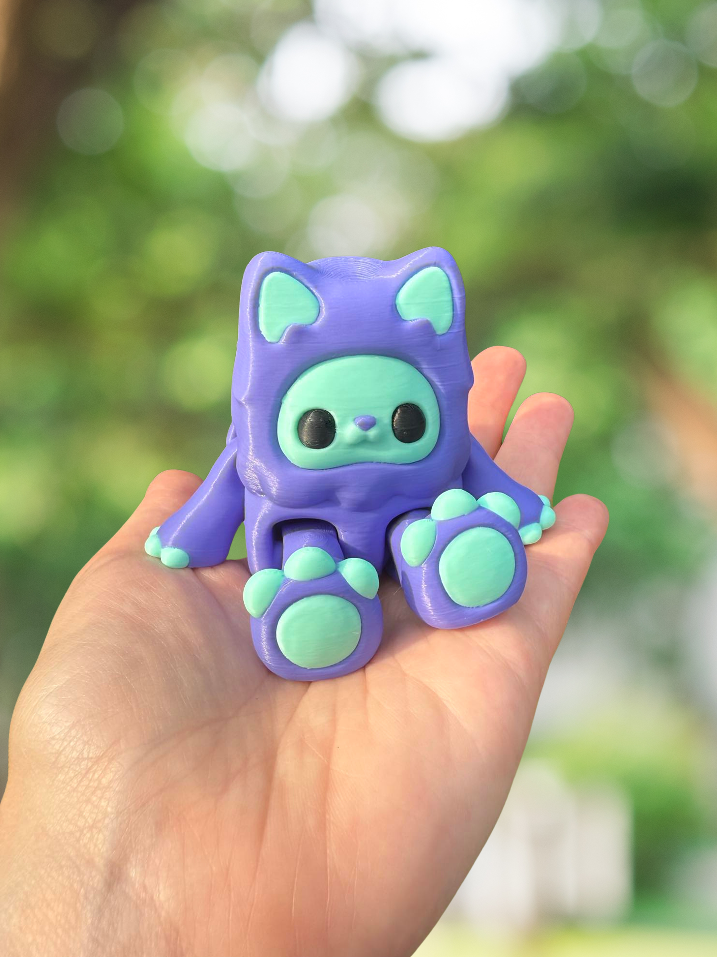 3D printed periwinkle kitty yeti articulated figurine