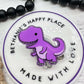 Purple dinosaur retractable badge reel