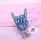 Rock on skeleton hand badge reel