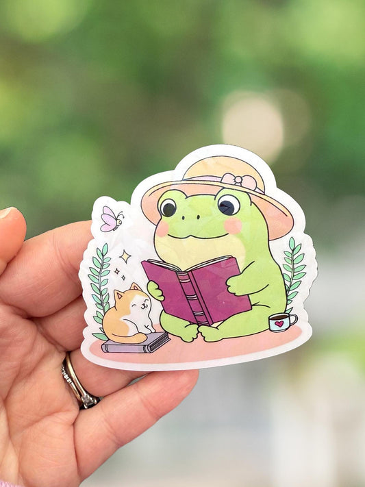 Frog reading a book sticker
