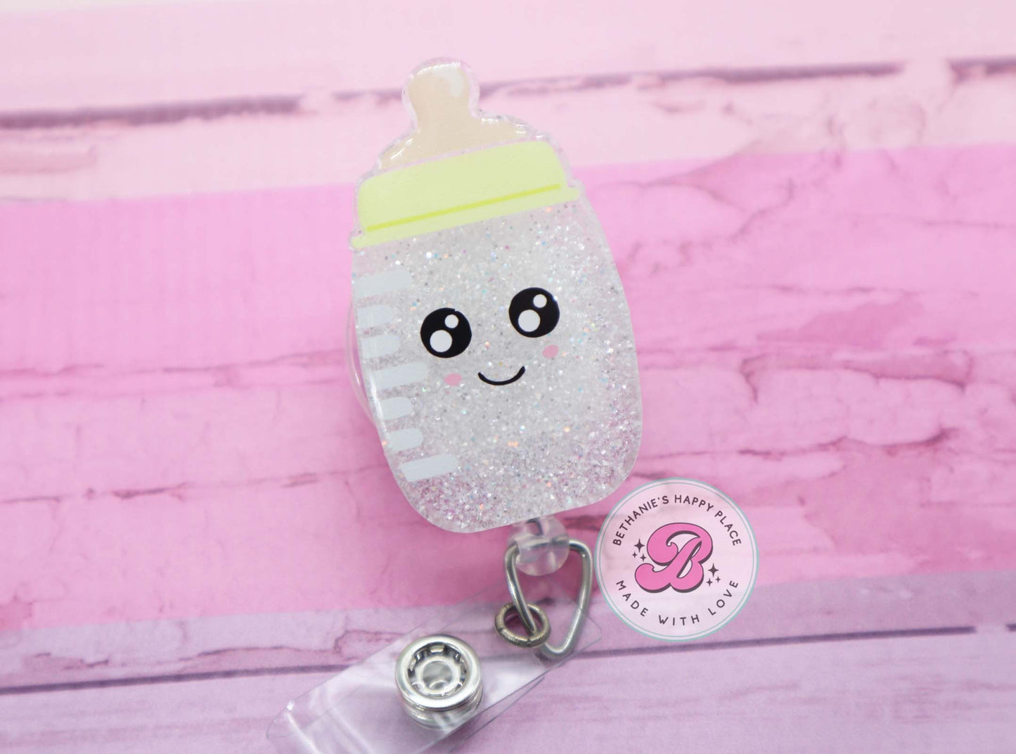 Baby bottle badge reel