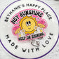 Keep on shining badge reel