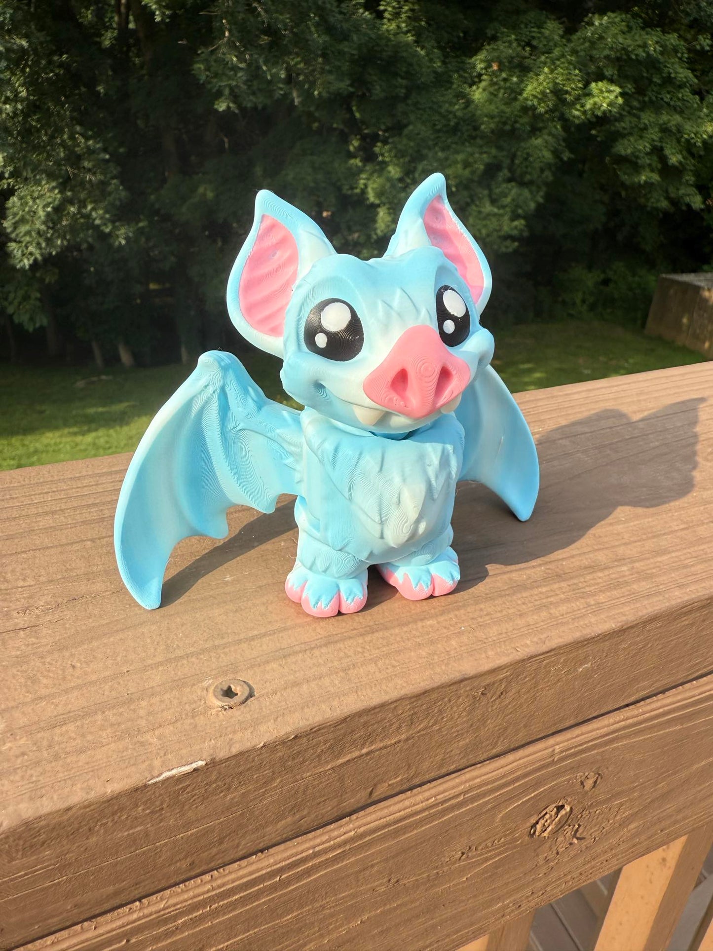Blue bat 3D printed articulated figurine