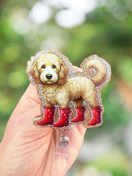 Goldendoodle in rainboots badge reel