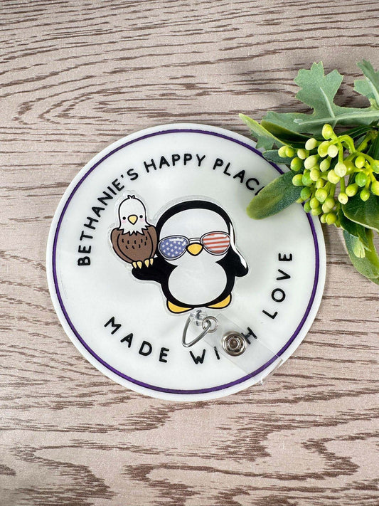 Patriotic penguin with eagle retractable badge reel