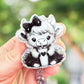 Black and white cow retractable badge reel