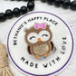 Brown owl badge reel
