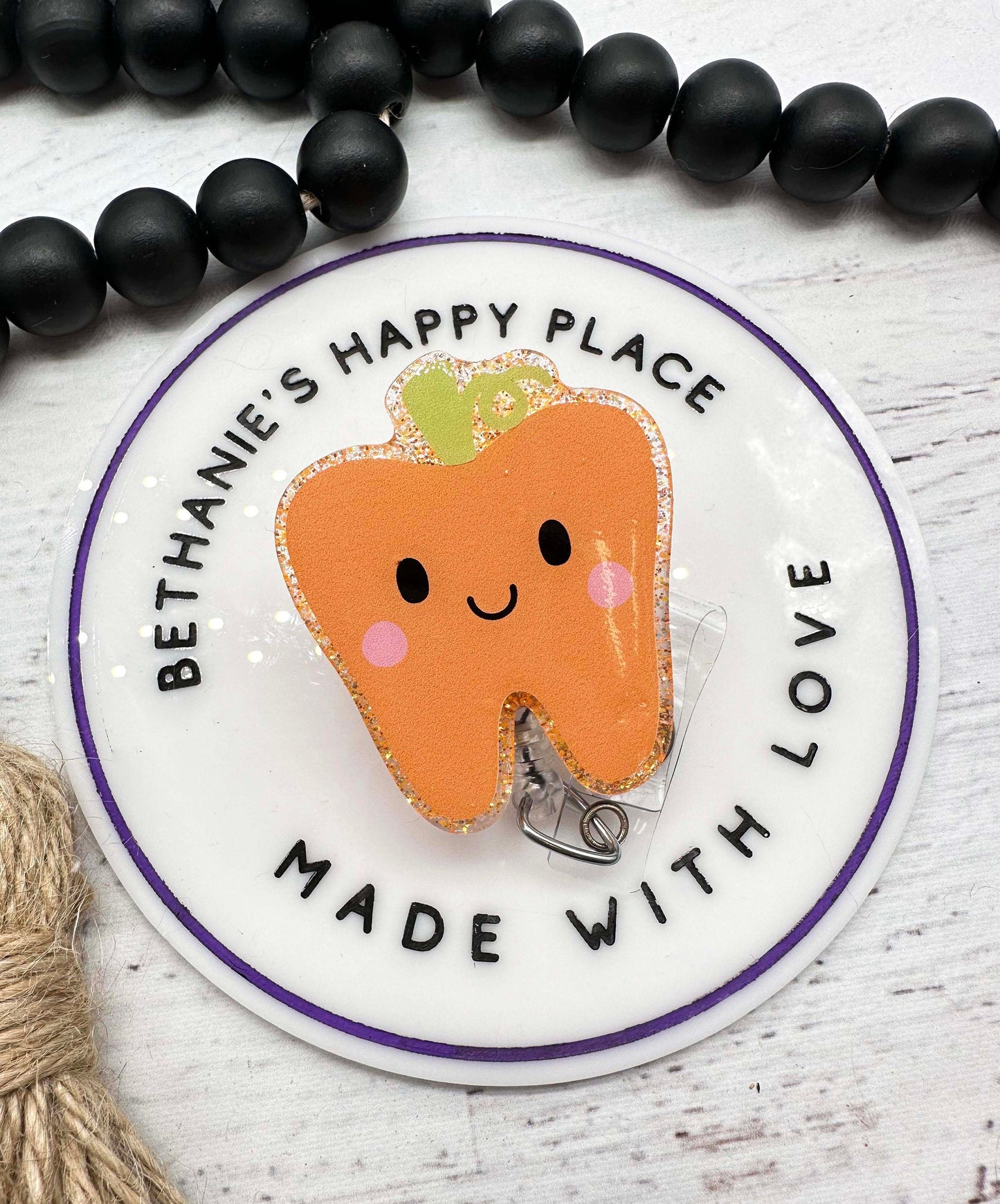 Pumpkin tooth badge reel