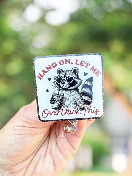 Hang on let me overthink this raccoon retractable badge reel
