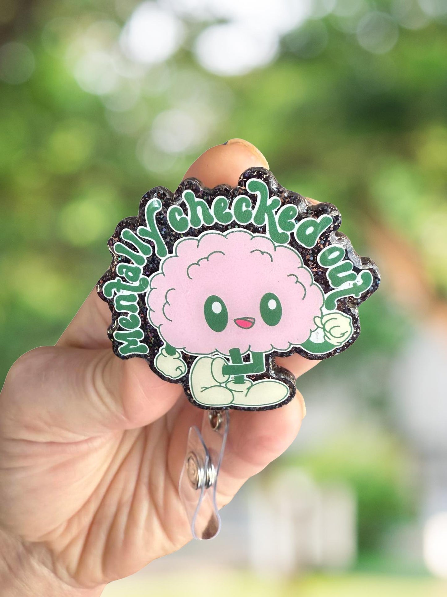 Mentally checked out retractable badge reel