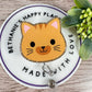 Orange cat face retractable badge reel