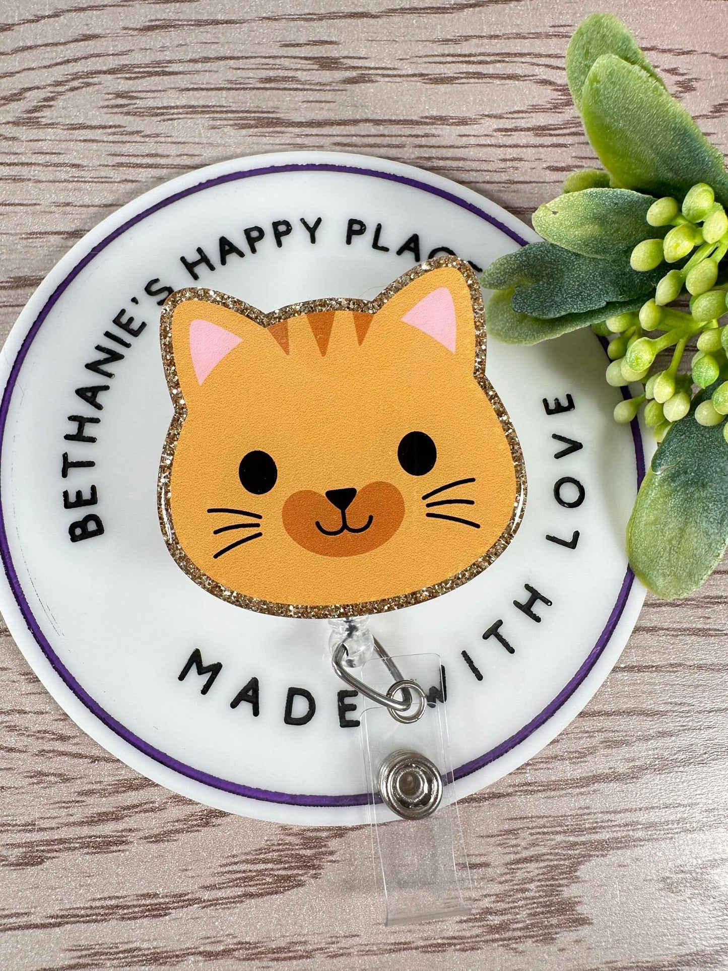 Orange cat face retractable badge reel