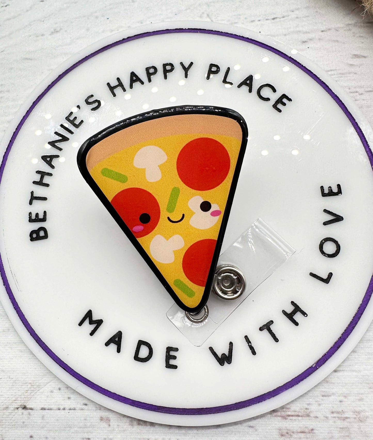 Pizza badge reel