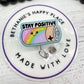 Stay positive battery badge reel
