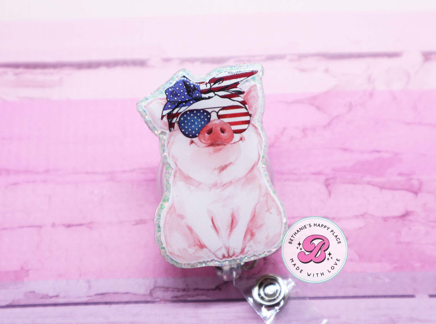 Patriotic pig badge reel