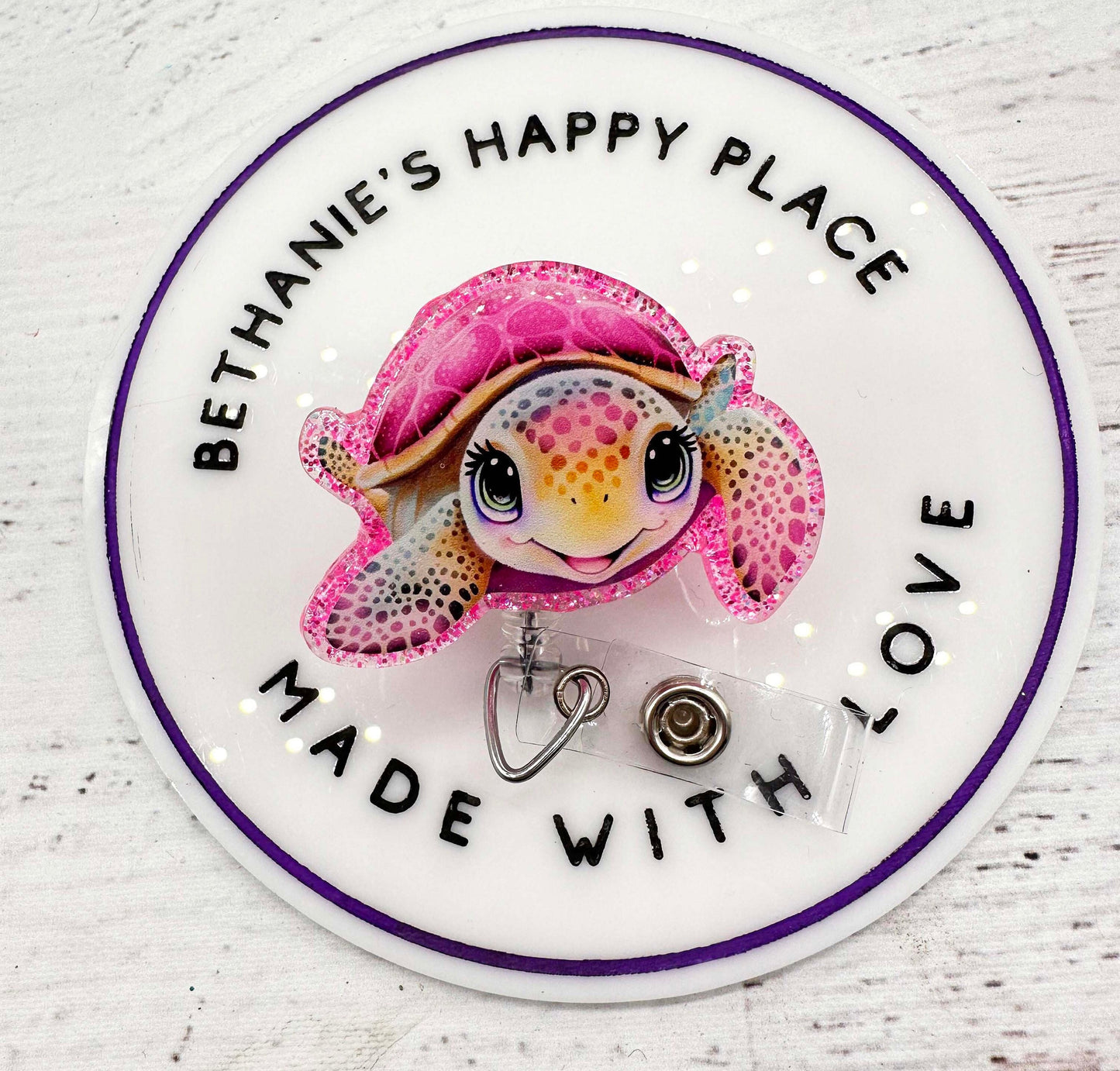 Pink sea turtle badge reel