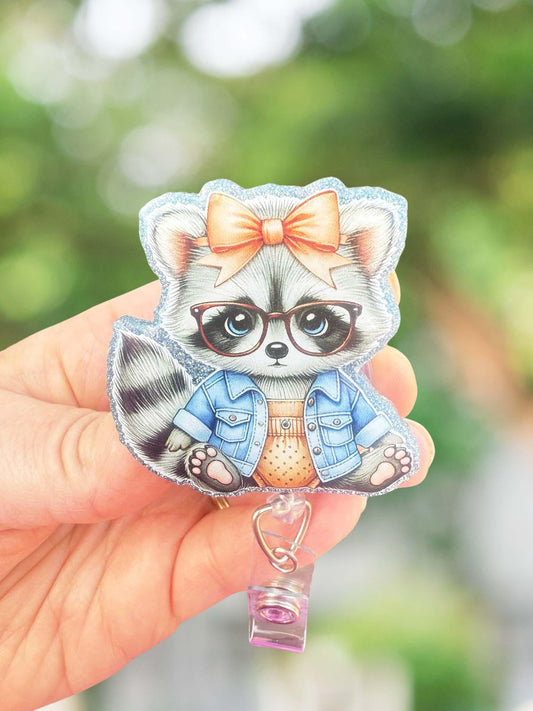 Cute raccoon in glasses badge reel