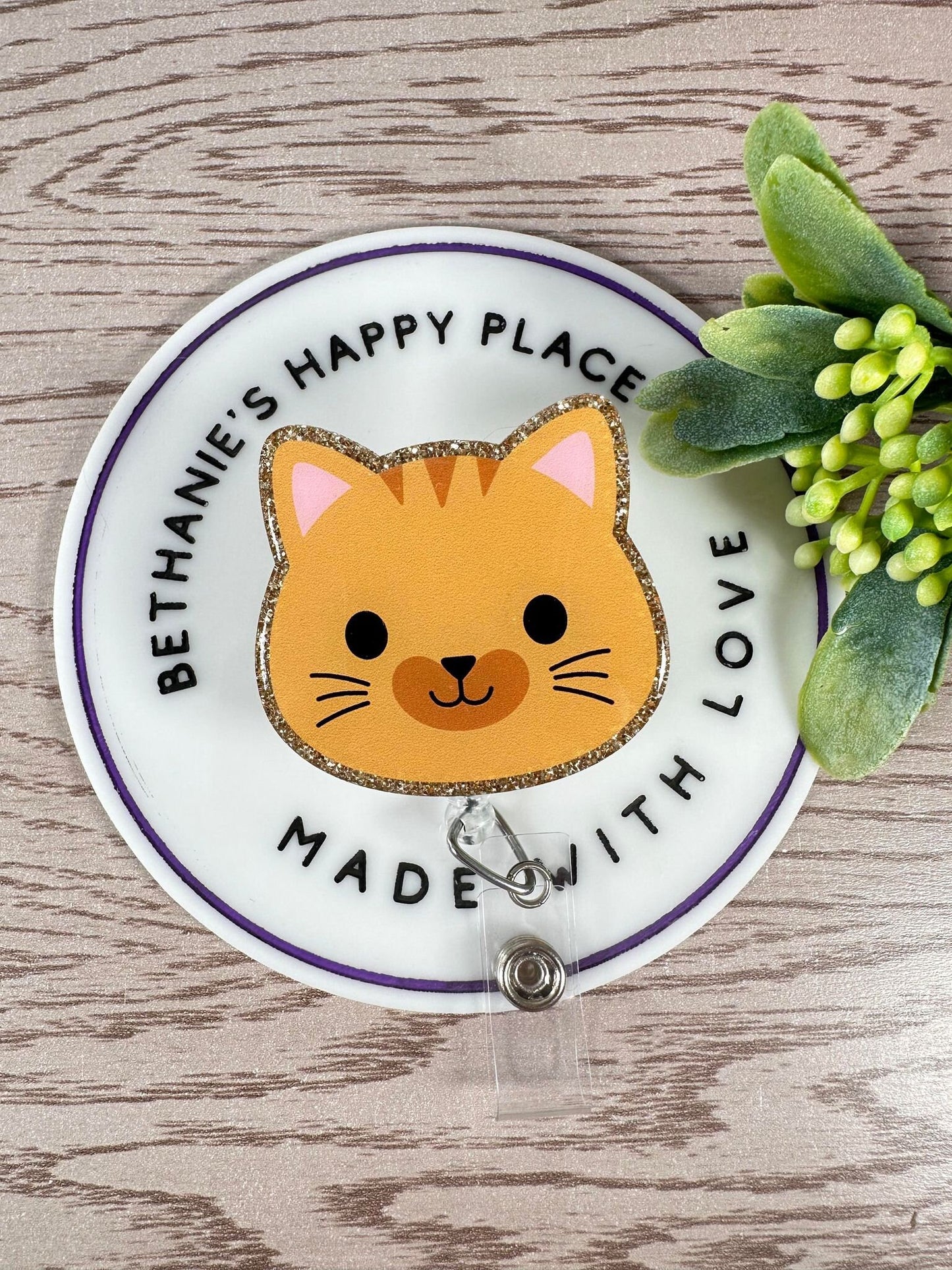 Orange cat face retractable badge reel