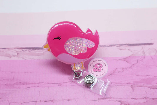 Pink bird badge reel