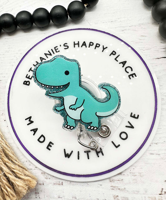 Teal dinosaur badge reel