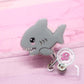 Shark badge reel