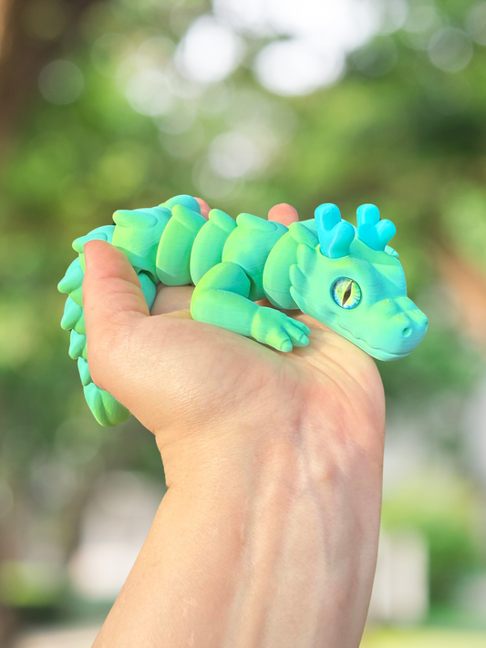 Blue green articulated Zou dragon