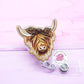 Highland cow badge reel