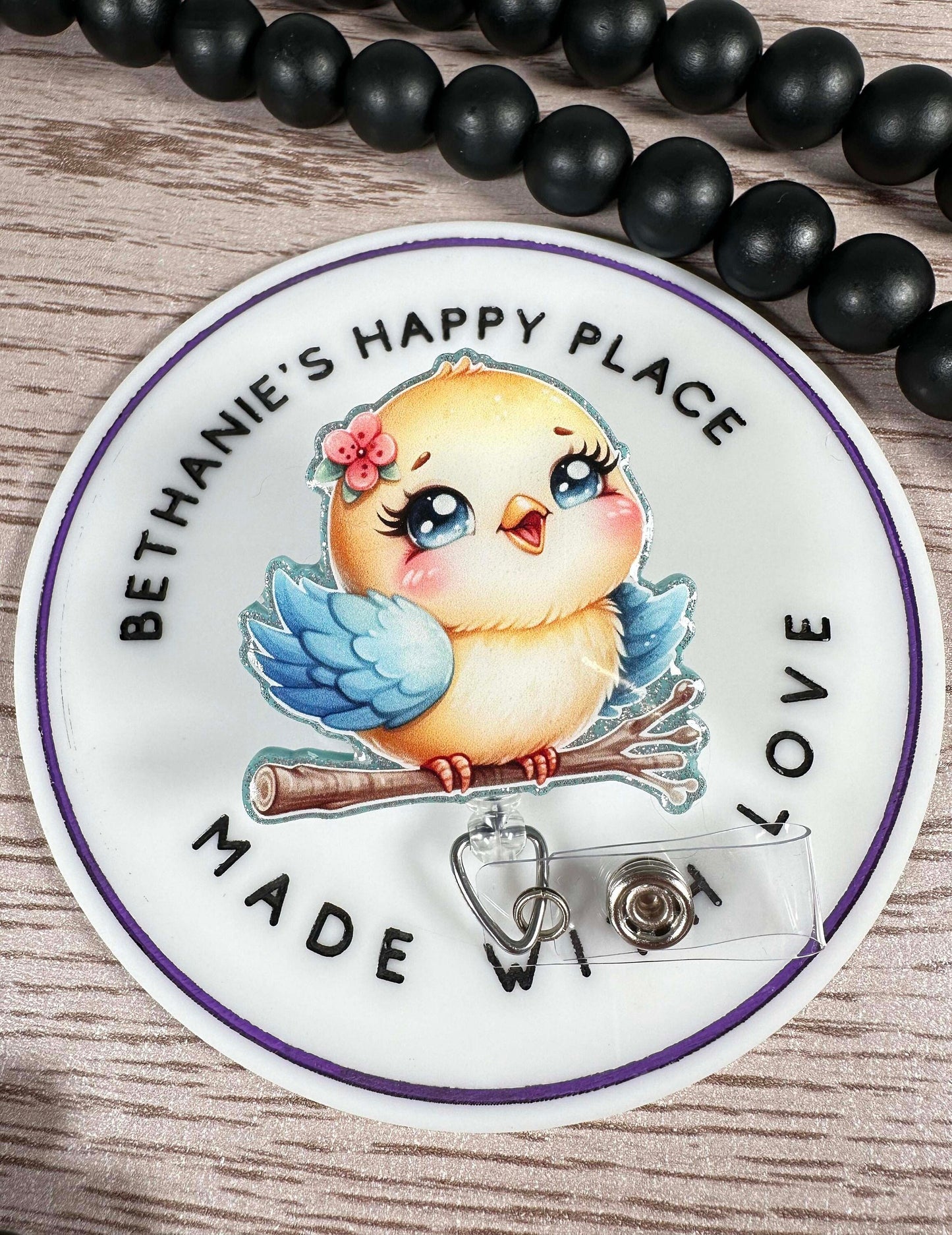 Bird retractable badge reel