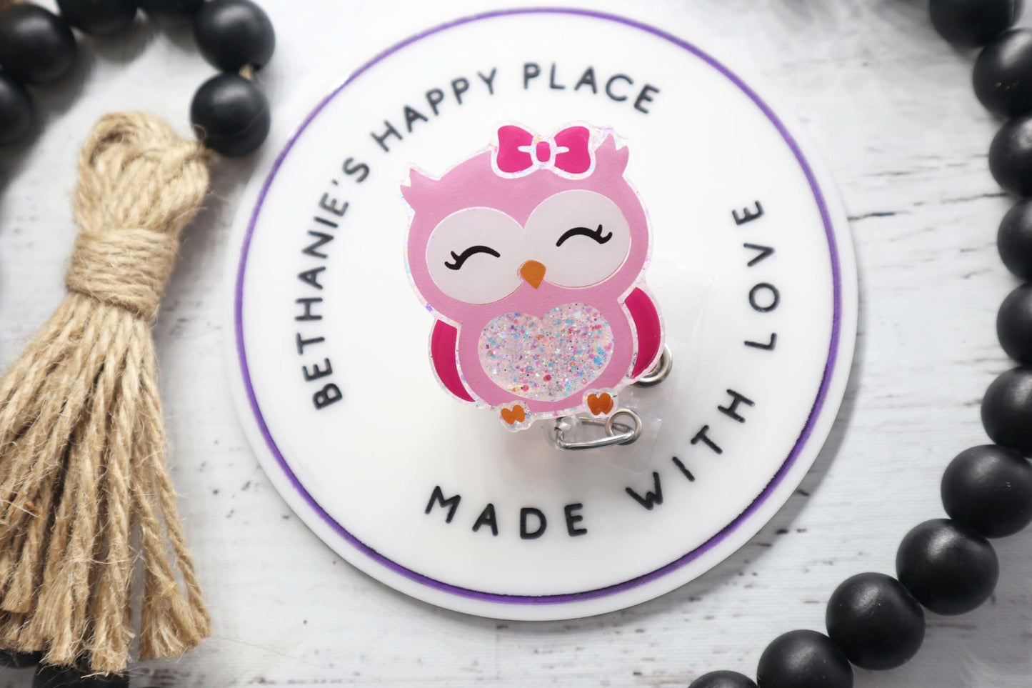 Pink owl badge reel