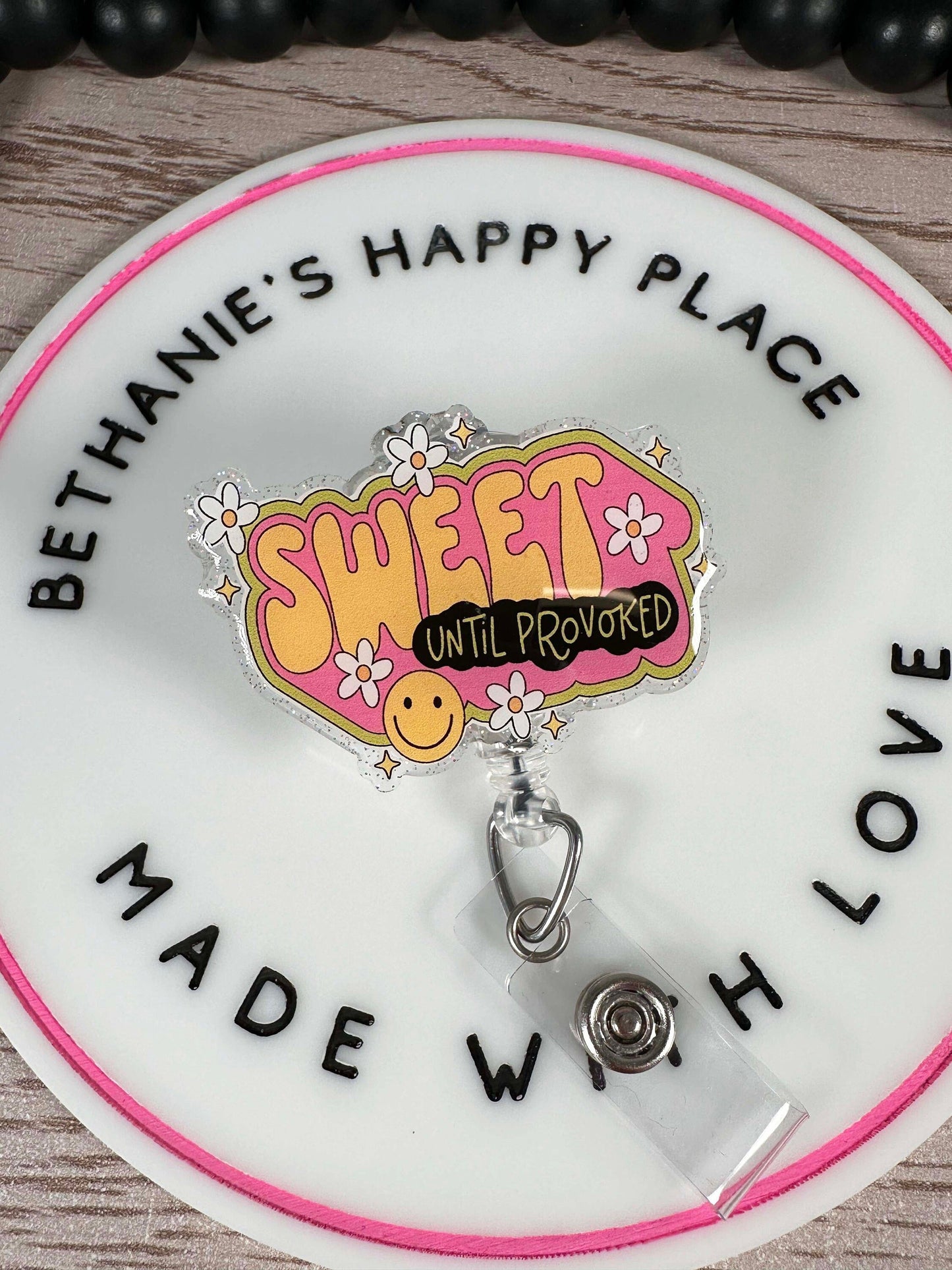 Sweet until provoked retractable badge reel