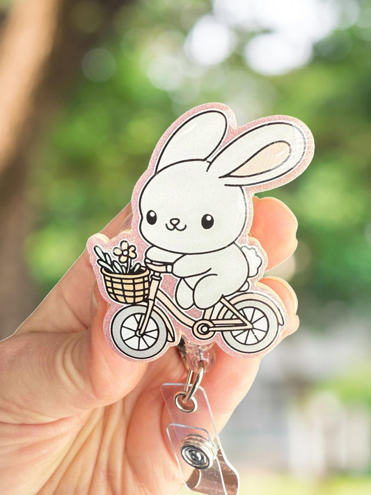 Spring bunny riding bike retractable badge reel