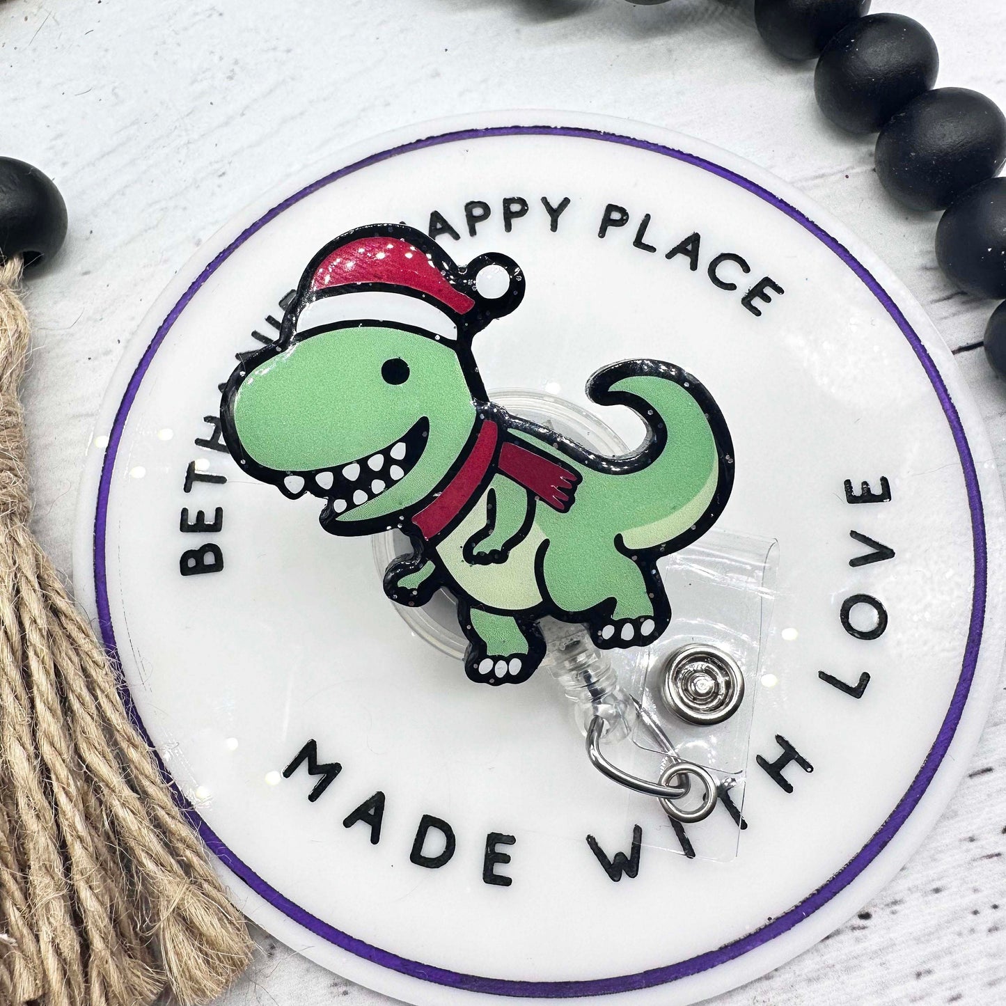 Christmas dinosaur badge reel