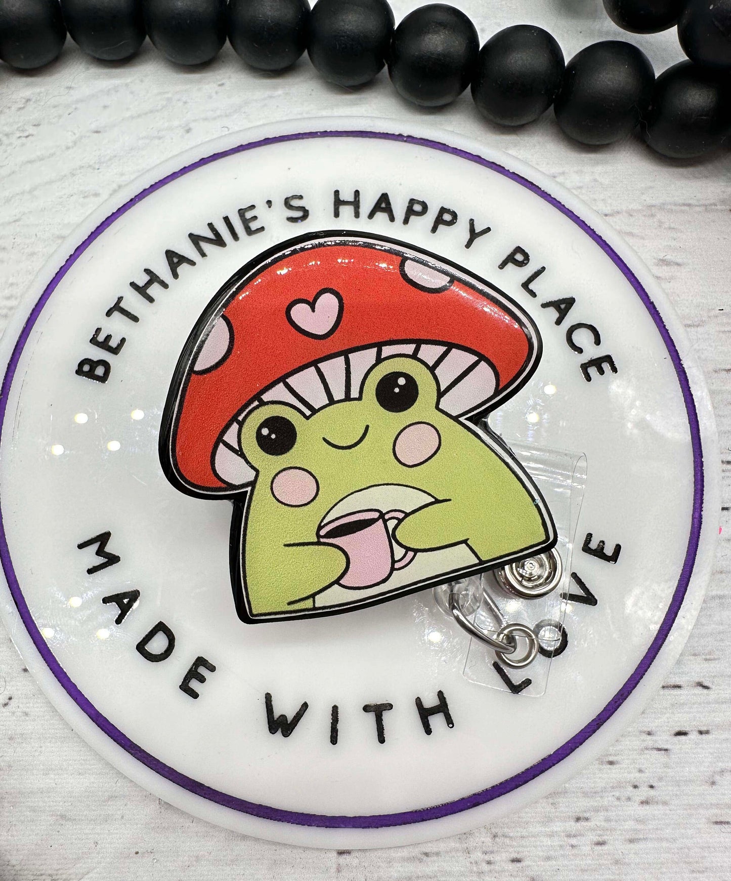 Frog mushroom head badge reel