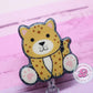 Cheetah badge reel