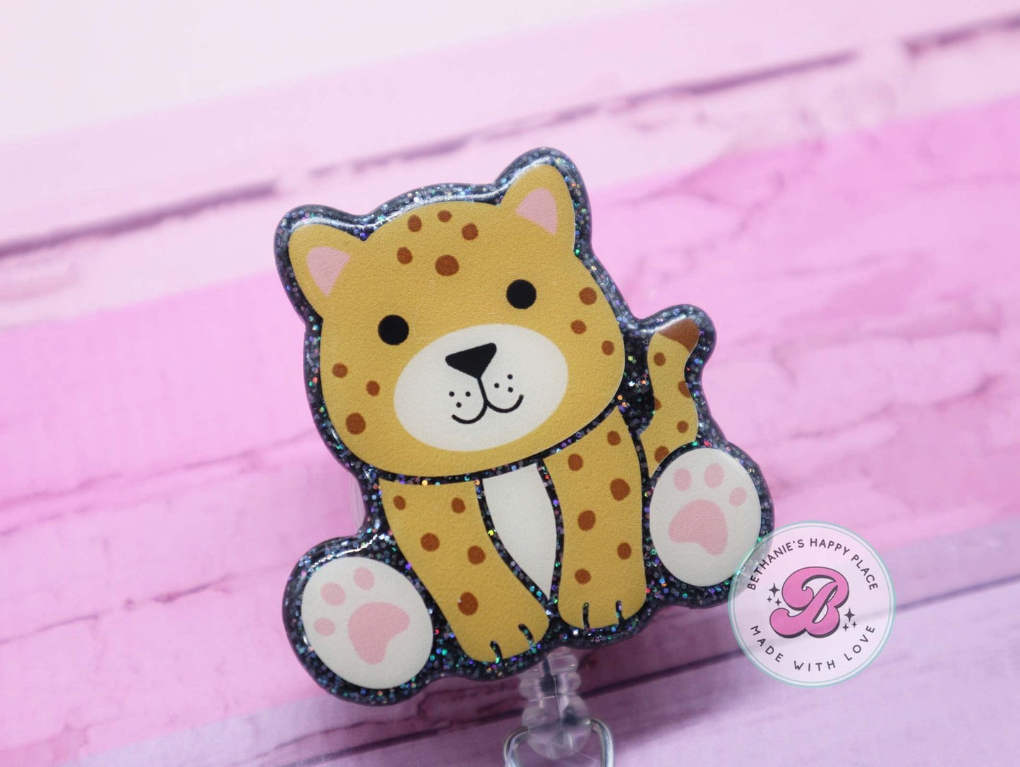 Cheetah badge reel