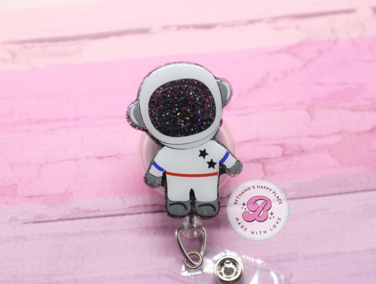 Astronaut badge reel