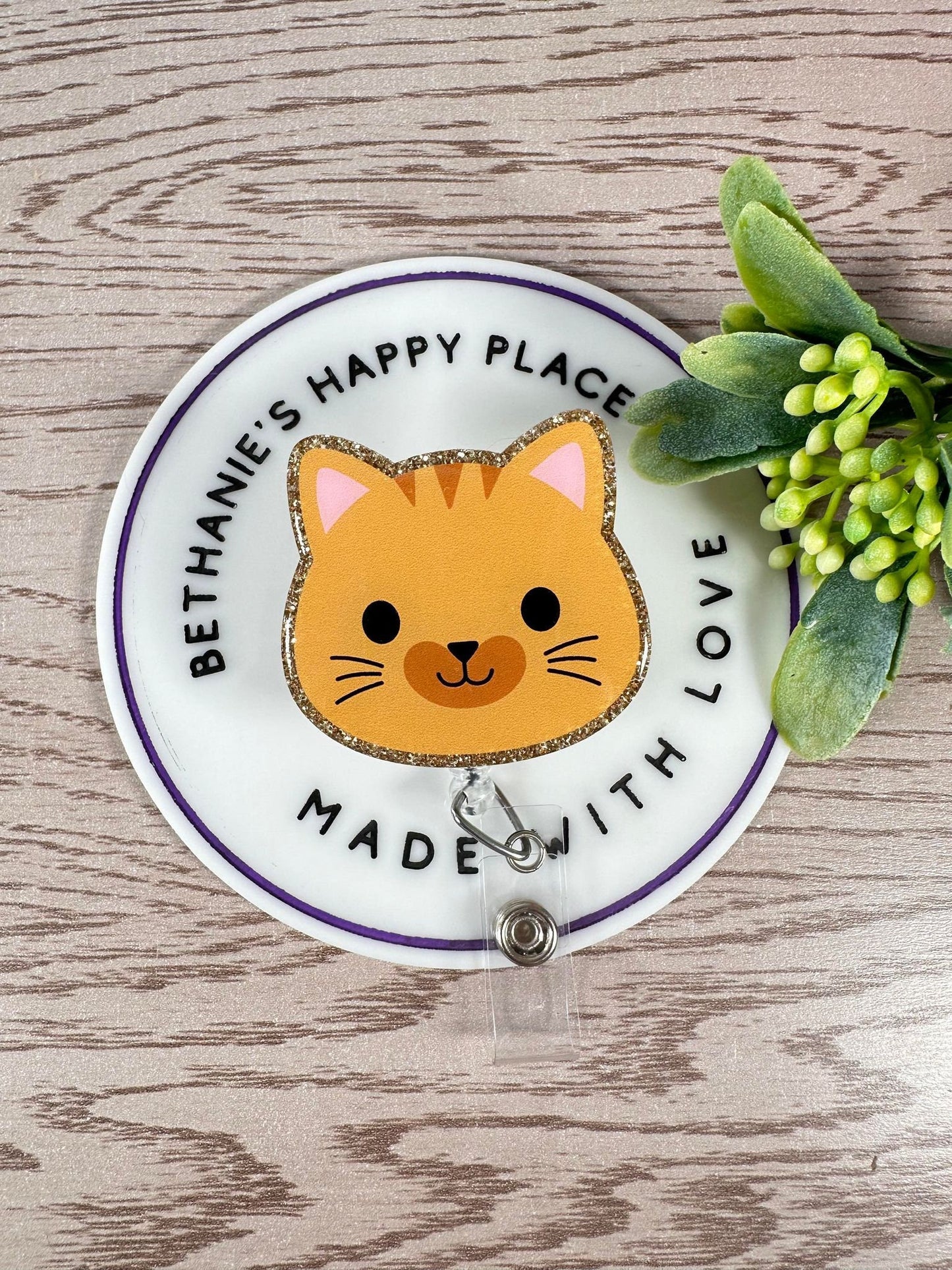 Orange cat face retractable badge reel