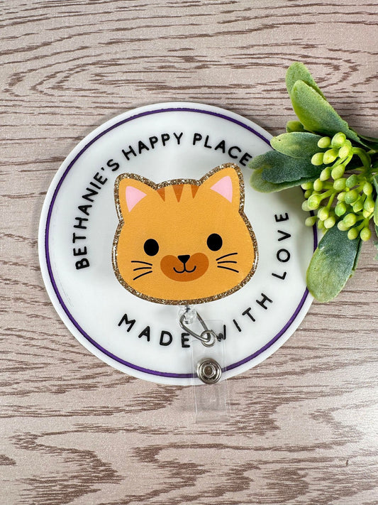 Orange cat face retractable badge reel