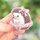 Hedgehog in pink tutu badge reel