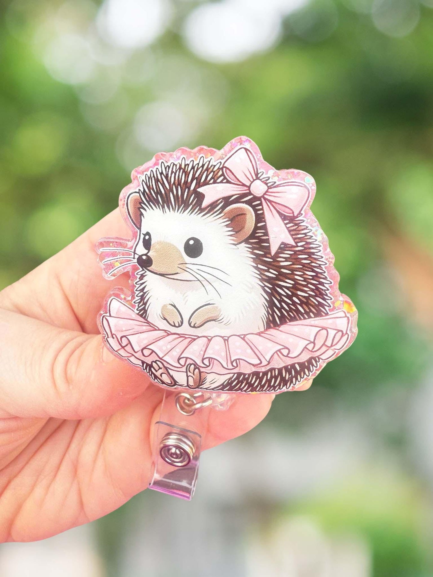 Hedgehog in pink tutu badge reel