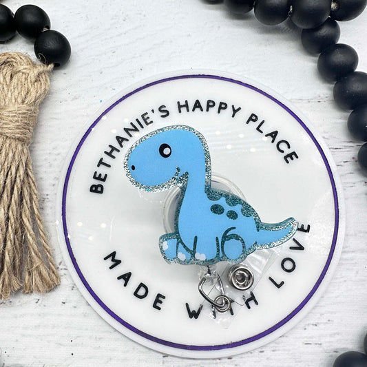Blue dinosaur bronotsaurus badge reel