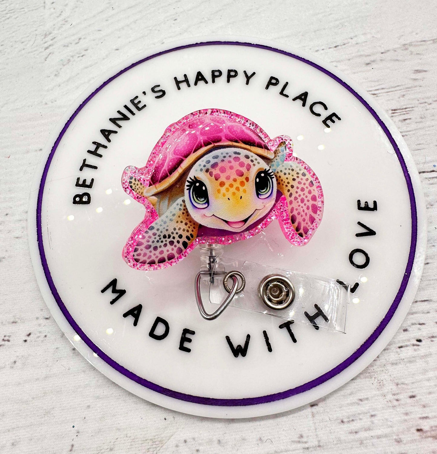 Pink sea turtle badge reel