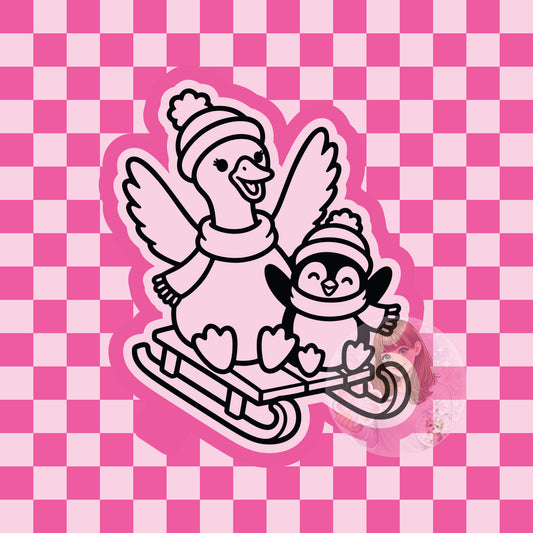 Goose and penguin sledding silicone freshie mold