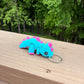 Blue and purple dinosaur keychain