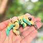 Rainbow dinosaur T-Rex keychain