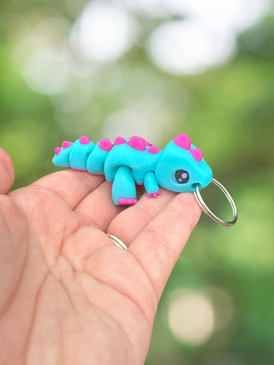 Blue and purple dinosaur keychain