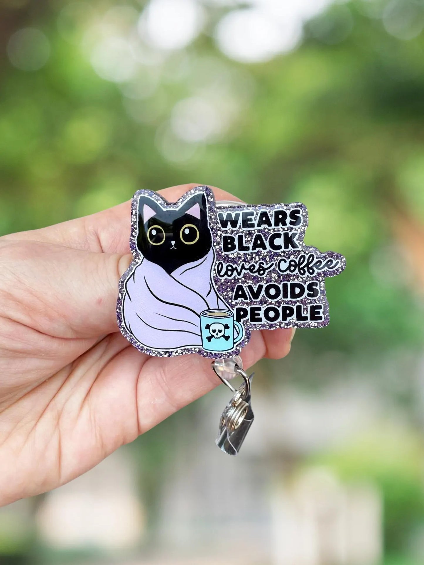 Wears black loves coffee avoids people retractable badge reel
