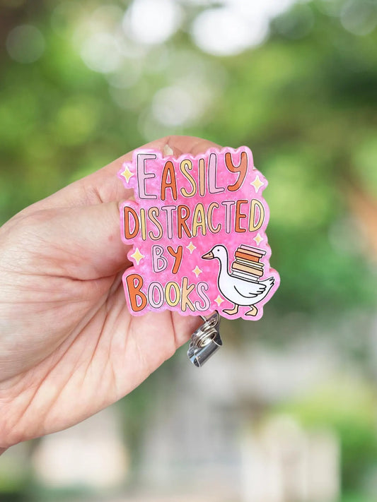 Easily distracted by books goose badge reel