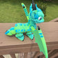 Large blue and green 3D printed articulated western dragon
